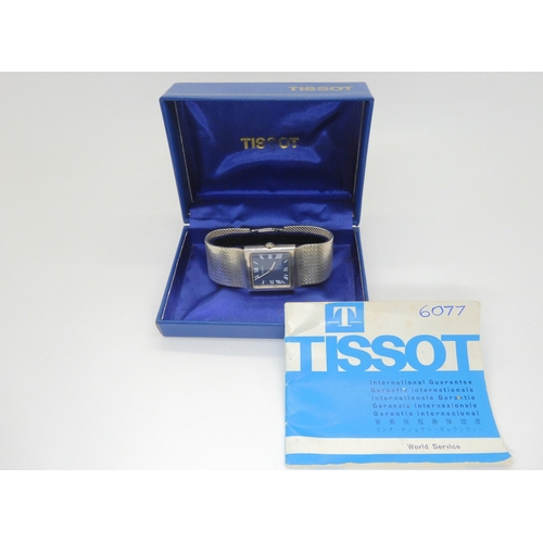 2894A - A GENTS VINTAGE SILVER TISSOT WRISTWATCHwith square blue dial white roman numerals and hands. Diamet... 