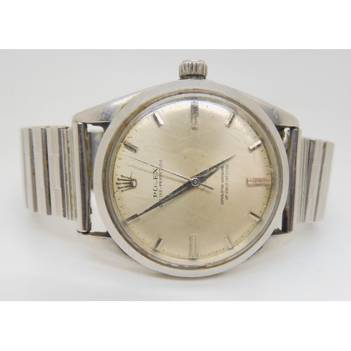 2896 - A STAINLESS STEEL ROLEX OYSTER PERPETUALwith silvered dial, silver coloured baton numerals and hands... 