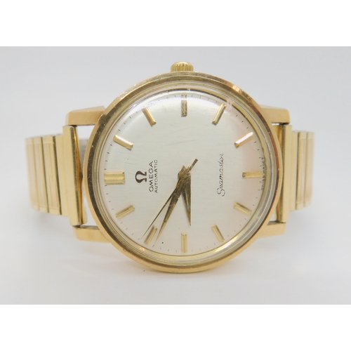 2896A - A 9CT GOLD GENTS OMEGA SEAMASTER AUTOMATICwith silvered dial with gold coloured baton numerals, diam... 