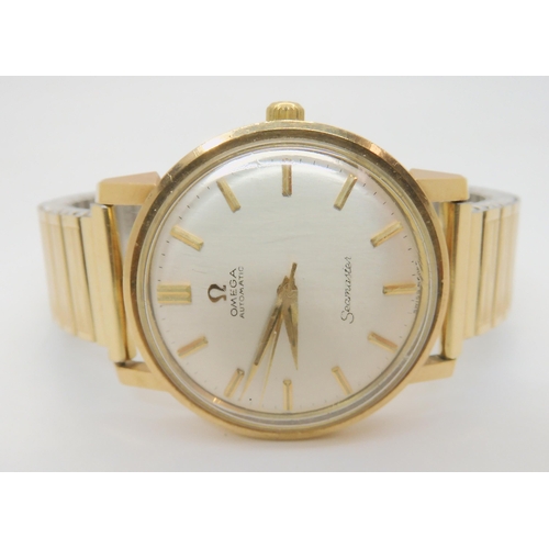 2896A - A 9CT GOLD GENTS OMEGA SEAMASTER AUTOMATICwith silvered dial with gold coloured baton numerals, diam... 