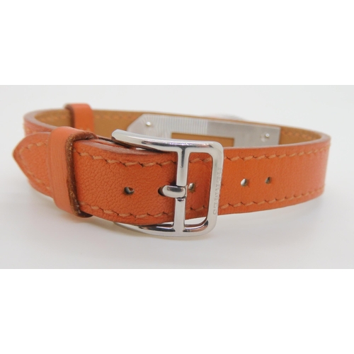 2897 - HERMES & BULGARI WATCHESHermes watch with orange leather strap, and stainless steel padlock styl... 