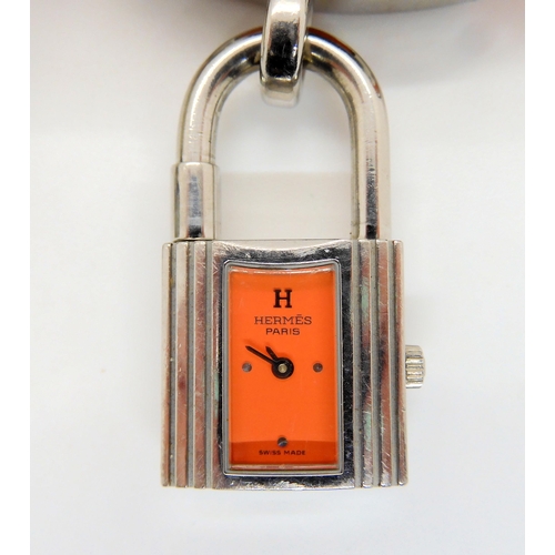 2897 - HERMES & BULGARI WATCHESHermes watch with orange leather strap, and stainless steel padlock styl... 