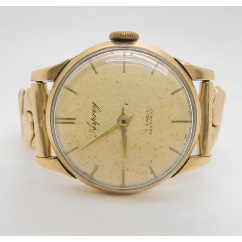 2898A - A 9CT GOLD ASPREY'S WRISTWATCHwith cream dial signed Asprey, 17 jewels Shockproof. With gold coloure... 