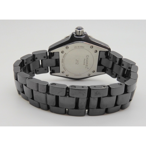 2898B - A DIAMOND CHANEL J12 QUARTZ WATCHthe case and the strap in black ceramic, with diamond set bezel. Th... 