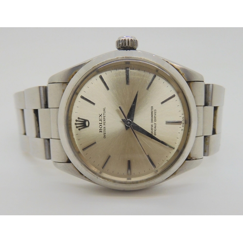 2899C - A ROLEX OYSTER PERPETUALwith stainless steel case and strap (78350). Silvered dial with silver colou... 