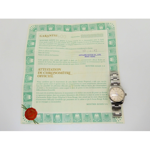 2899C - A ROLEX OYSTER PERPETUALwith stainless steel case and strap (78350). Silvered dial with silver colou... 