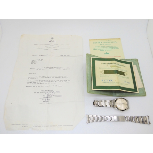 2899D - A ROLEX OYSTER PERPETUALwith stainless steel case and strap (78350). Silvered dial with silver colou... 