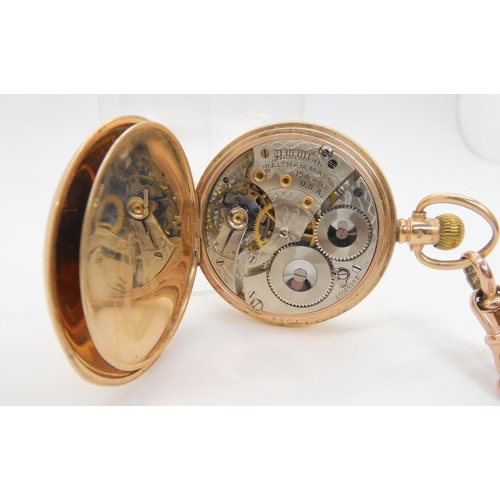 2900 - A 9CT GOLD WALTHAM FULL HUNTERwith white enamelled dial with black roman numerals, subsidiary second... 