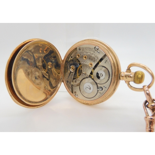 2900 - A 9CT GOLD WALTHAM FULL HUNTERwith white enamelled dial with black roman numerals, subsidiary second... 