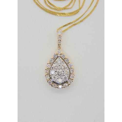 2702 - A DIAMOND SET PENDANT AND CHAINfrom the Jewellery Channel Iliana collection, the 14k gold pear shape... 