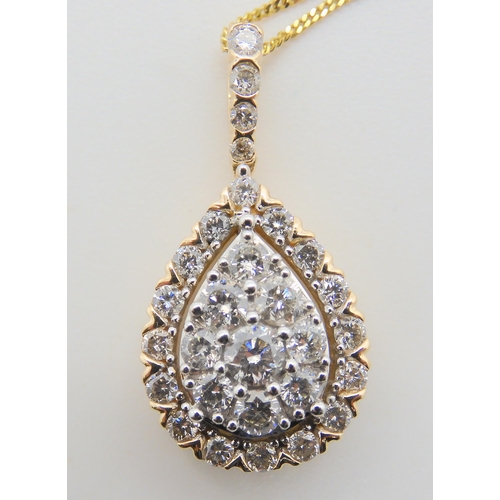 2702 - A DIAMOND SET PENDANT AND CHAINfrom the Jewellery Channel Iliana collection, the 14k gold pear shape... 
