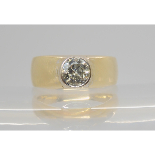 2708 - A DIAMOND SOLITAIRE RINGset with an estimated approx 0.60cts brilliant cut diamond in a bezel settin... 