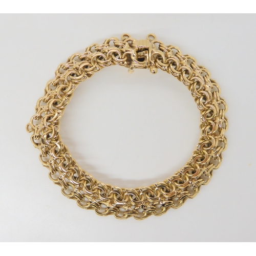 2716 - AN 18CT GOLD FANCY DOUBLE LINK BRACELETwith box clasp, length 19.5cm, weight 31.8gms... 