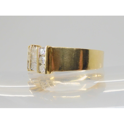 2718 - A 14K GOLD DIAMOND DRESS RINGset with estimated approx 1.38cts of brilliant and baguette cut diamond... 