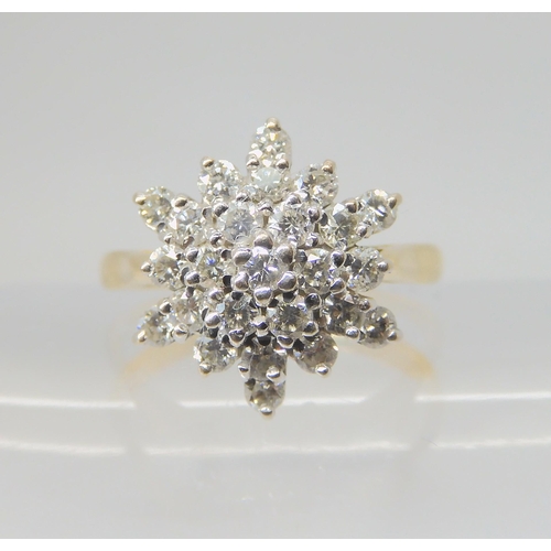 2720 - A DIAMOND SNOWFLAKE RINGmounted throughout in 18ct yellow and white gold, set with estimated approx ... 