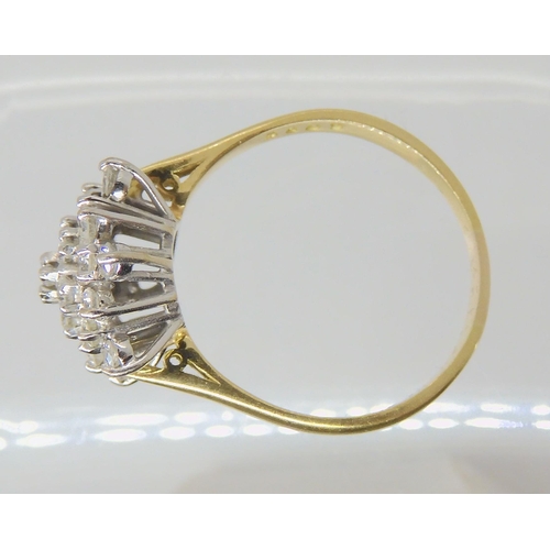 2720 - A DIAMOND SNOWFLAKE RINGmounted throughout in 18ct yellow and white gold, set with estimated approx ... 