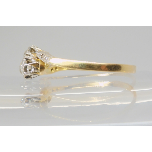 2721 - A TWIN STONE DIAMOND RINGthe bright yellow and white metal mount is set with two old cut diamonds, w... 