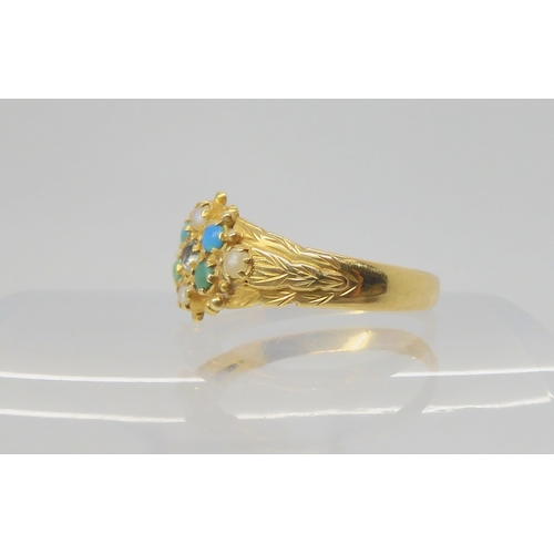 2736 - AN 18CT GOLD VINTAGE RINGset with turquoise, pearls and a clear gem, the shank engraved with leaves.... 