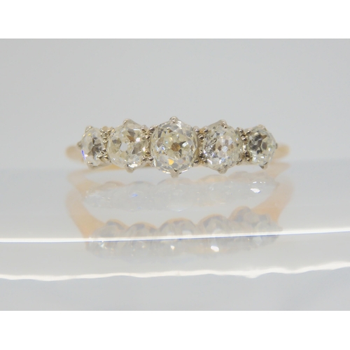 2739 - A FIVE STONE DIAMOND RINGset with estimated approx 0.60cts of old cut diamonds. Finger size O1/2, we... 