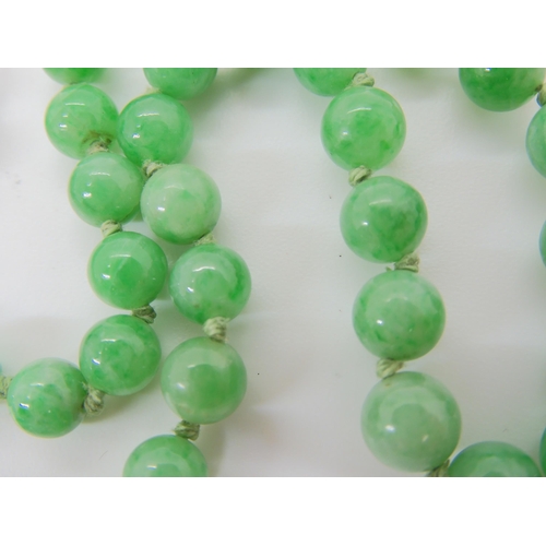 2749 - CHINESE GREEN HARDSTONE BEADSthe beads are tapered in size from 7.2mm to 4.6mm, length of string 48c... 