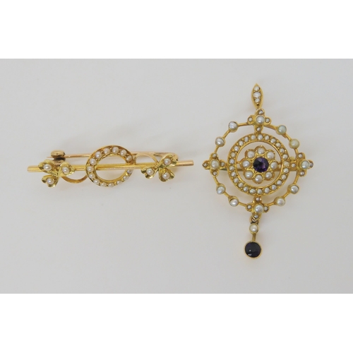 2751 - AN EDWARDIAN PENDANT AND BROOCHthe pendant is set with amethysts and split pearls, mounted in yellow... 