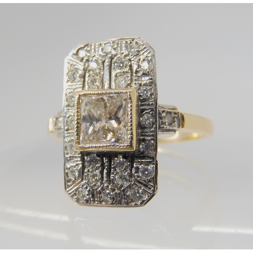 2757 - A 9CT GOLD DIAMOND PANEL RINGset with a pale champagne colour princess cut of estimated approx 0.64c... 
