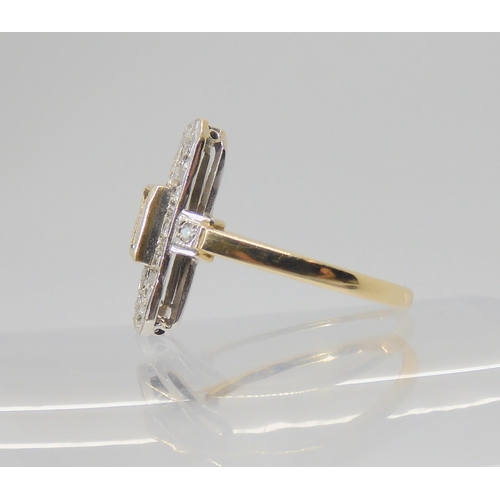 2757 - A 9CT GOLD DIAMOND PANEL RINGset with a pale champagne colour princess cut of estimated approx 0.64c... 