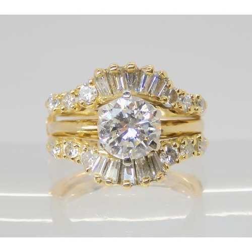 2766 - A 14K TWO PART DIAMOND DRESS RINGcomprising of a removable diamond solitaire of estimated approx 1ct... 