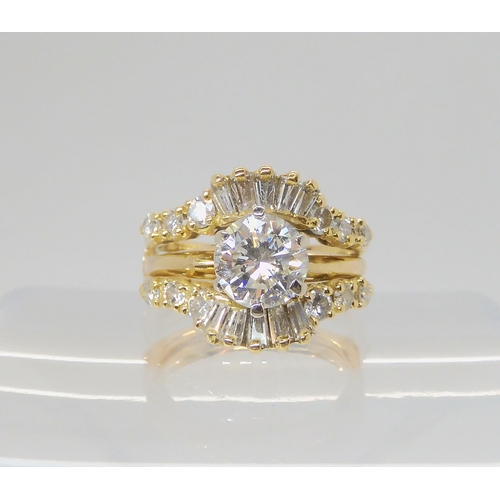 2766 - A 14K TWO PART DIAMOND DRESS RINGcomprising of a removable diamond solitaire of estimated approx 1ct... 