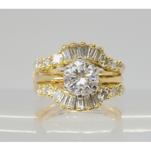 2766 - A 14K TWO PART DIAMOND DRESS RINGcomprising of a removable diamond solitaire of estimated approx 1ct... 