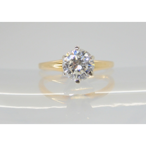 2766 - A 14K TWO PART DIAMOND DRESS RINGcomprising of a removable diamond solitaire of estimated approx 1ct... 