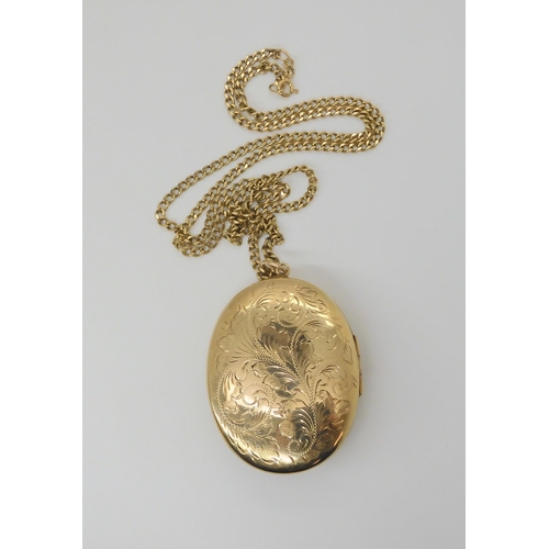 2767 - A LARGE 9CT CAMEO LOCKET & CHAINthe large locket 7cm (including bail) x 4.7cm, with full Birming... 