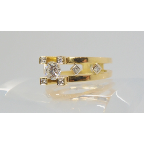 2784 - A RETRO 18CT GOLD SOLITAIRE DIAMOND RINGset with an estimated approx 0.60ct brilliant cut diamond, f... 