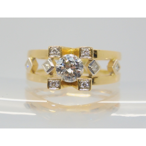 2784 - A RETRO 18CT GOLD SOLITAIRE DIAMOND RINGset with an estimated approx 0.60ct brilliant cut diamond, f... 