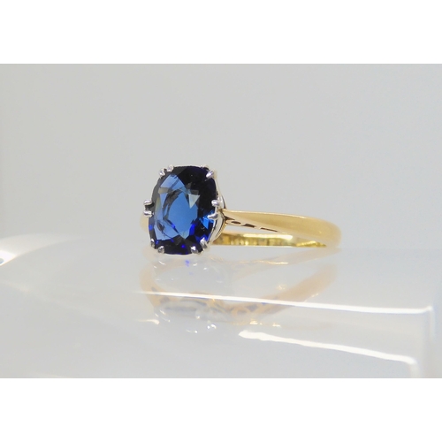 2789 - A SAPPHIRE RINGwith an 18ct and platinum, classic crown mount. Finger size L, weight 2.4gms... 