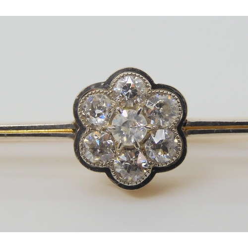 2790 - A DIAMOND FLOWER BAR BROOCHthe mount in yellow and white metal and set with estimated approx 0.50cts... 