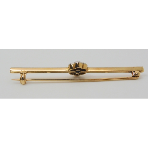 2790 - A DIAMOND FLOWER BAR BROOCHthe mount in yellow and white metal and set with estimated approx 0.50cts... 