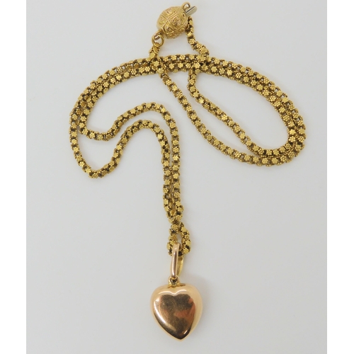 2791 - A VINTAGE PEARL HEART PENDANTthe bright yellow metal heart is set with split pearls, length with bai... 