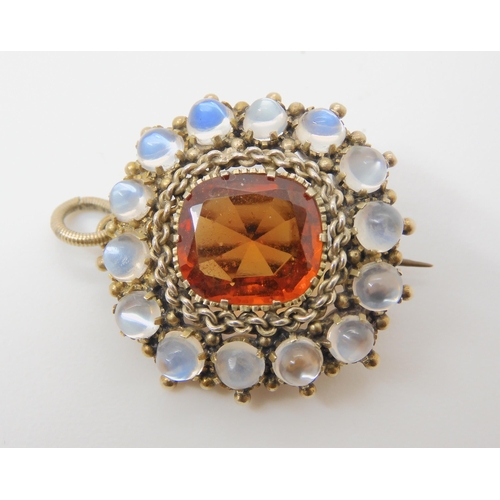 2793 - A HESSONITE GARNET & MOONSTONE PENDANTthe orange garnet is st in a white metal chain link settin... 