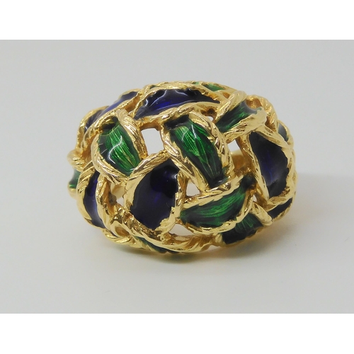 2799 - AN ENAMELLED KUTCHINSKY RINGthe woven pattern enamelled in blue and green, Full Kutchinsky signature... 