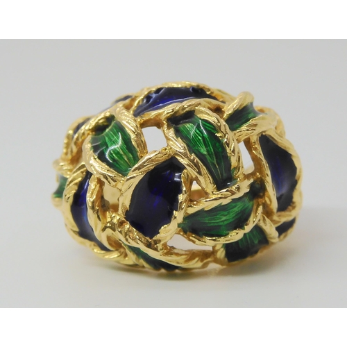 2799 - AN ENAMELLED KUTCHINSKY RINGthe woven pattern enamelled in blue and green, Full Kutchinsky signature... 