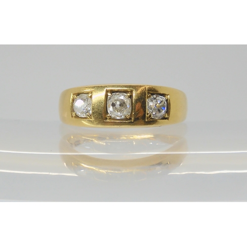 2801 - A VICTORIAN THREE STONE DIAMOND RINGthe 18ct gold shank, hallmarked 1860 Birmingham, set with three ... 