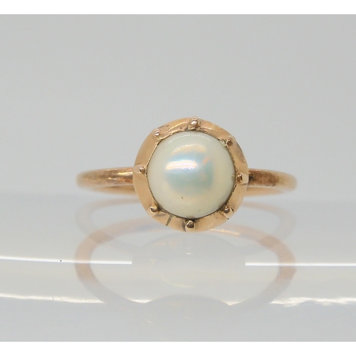 2802 - A VICTORIAN PEARL SET RINGsize of the pearl approx 6.1mm, in cut back setting. Mounted in rose colou... 