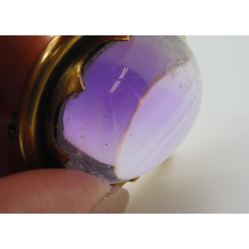 2804 - A LARGE AMETHYST BROOCHmounted in yellow metal mount. size of the amethyst 3cm x 2.5cm, size of moun... 