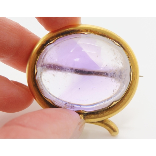 2804 - A LARGE AMETHYST BROOCHmounted in yellow metal mount. size of the amethyst 3cm x 2.5cm, size of moun... 