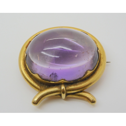 2804 - A LARGE AMETHYST BROOCHmounted in yellow metal mount. size of the amethyst 3cm x 2.5cm, size of moun... 