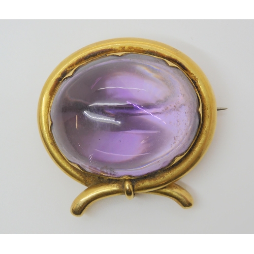 2804 - A LARGE AMETHYST BROOCHmounted in yellow metal mount. size of the amethyst 3cm x 2.5cm, size of moun... 