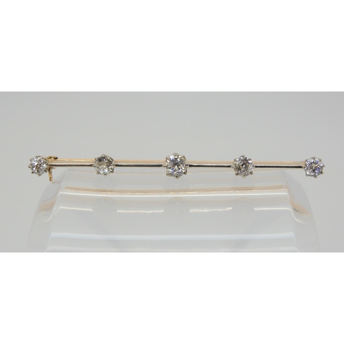 2805 - AN OLD CUT DIAMOND BROOCHthe yellow and white metal bar brooch set with estimated approx 0.80cts of ... 