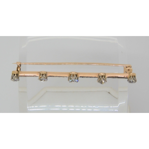 2805 - AN OLD CUT DIAMOND BROOCHthe yellow and white metal bar brooch set with estimated approx 0.80cts of ... 