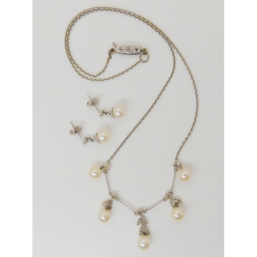 2814 - NECKLET WITH MATCHING EARRINGSthe pearl and diamond necklet with five twin leaf pattern drops set wi... 